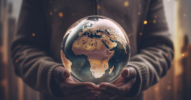 händer som håller i jordklot